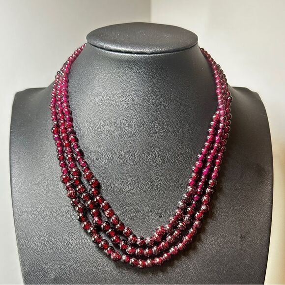 No Brand Jewelry - Three strands of SOLID GARNET graduated beaded necklace with silver tone clasp!